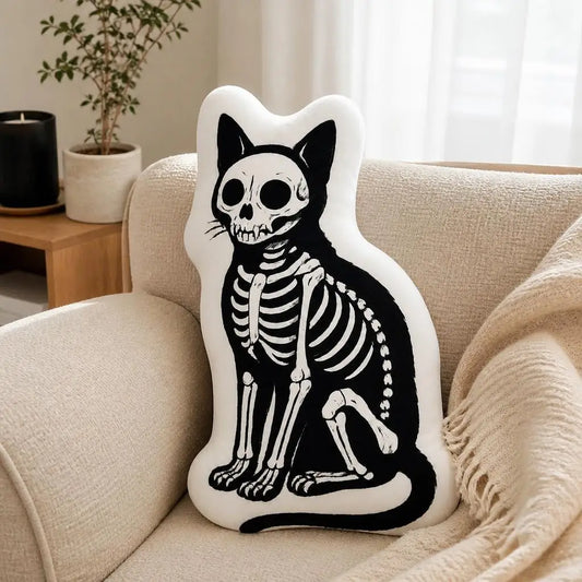 Cojín de peluche con gato esqueleto